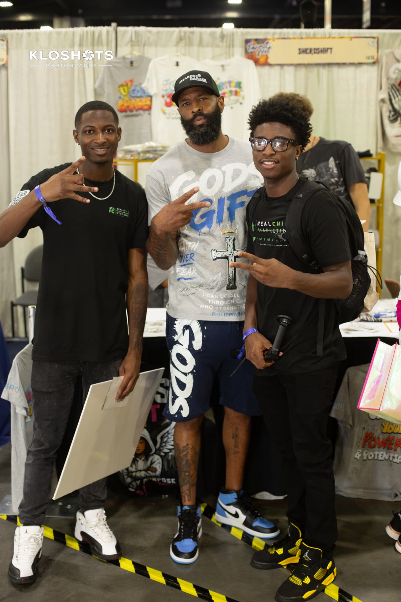 RealChill Marketing team members networking with a vendor at an Atlanta expo